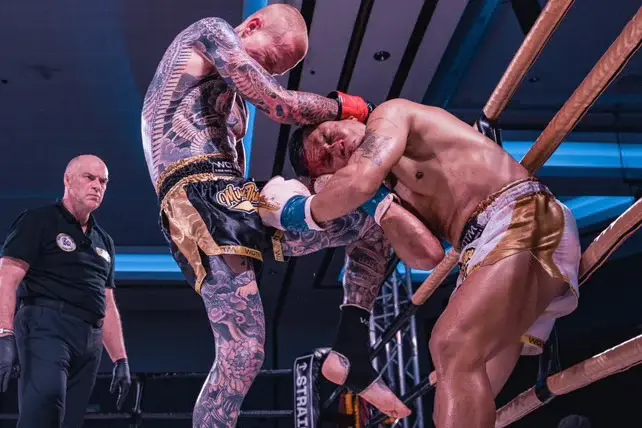 Brandon Spain in a fight — active professional Muay Thai competitor